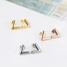 V pattern stud earrings - titanium steelOorbellen