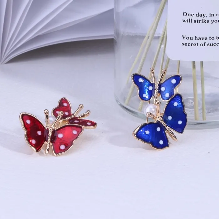 Broches double papillon de printemps
