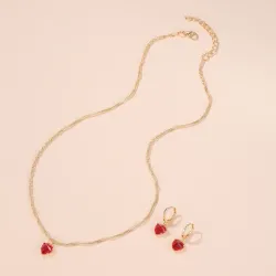 Gouden ketting en oorbellen set - met rood hartHalskettingen