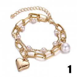 Bracelet élégant avec charmes & perles