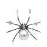 Araignée blanche avec perle - broche élégante
