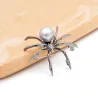 Araignée blanche avec perle - broche élégante