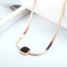 Rose gold snake chain necklace - with black charm
