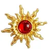 Vintage zon / zonnebloem vormige oorbellen - met rode parelOorbellen