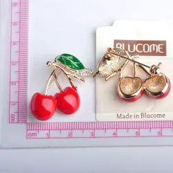 Elegant brooch with red crystal cherry