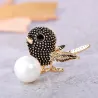 Cute bird shaped - crystal brooch - with pearl decoration