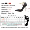 Elegant high heel pumps - with a metal ankle chainHigh heels