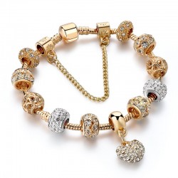 Luxe gouden armband - met kristal kralen / hartArmbanden