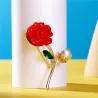 Rode roos met parel / kristallen blad - brocheBroches