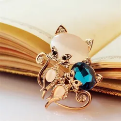 Brooch with two crystal foxes