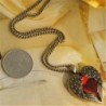 Exclusive necklace with heart shaped pendant with red crystal - vintage bronzeNecklaces