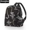 Mini sac à dos tendance - imperméable - visage abstrait imprimé