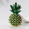 Elegante broche met groene kristalananasBroches