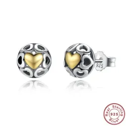 Exclusieve oorknopjes - uitgeholde hartjes - geel zirkoon hartje - 925 sterling zilverOorbellen