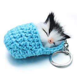 Chat endormi dans un lit de camp tissé à la main - porte-clés
