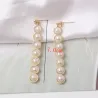 Boucles d'oreilles longues dorées élégantes - métal géométrique avec perles