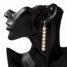 Boucles d'oreilles longues dorées élégantes - métal géométrique avec perles