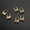 Lock shaped gold earrings - with crystalsEarrings