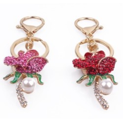 Rose en cristal avec perle - porte-clés