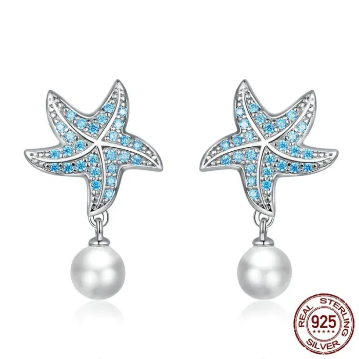 Blauwe zirkonia zeester oorbellen - met parel - 925 sterling zilverOorbellen