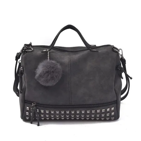 Vintage tas van nubuckleer met klinknagels / pom pom van bontTassen
