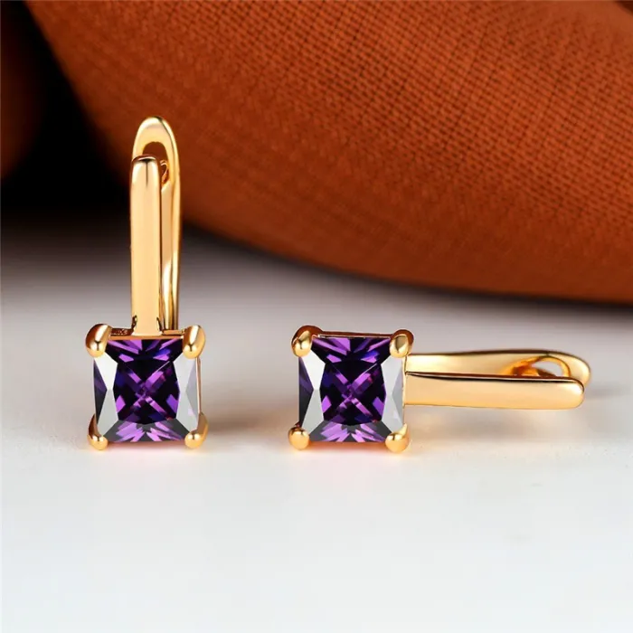 Boucles d'oreilles élégantes en or - avec zircon carré