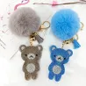 Ourson en cristal avec pompon en fourrure - porte-clés