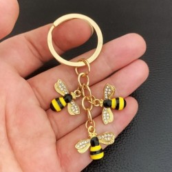 Kristallen bijen / honingraat - gouden sleutelhangerSleutelhangers