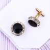 Gouden ronde manchetknopen - kristallen / zwart emailleManchetknopen
