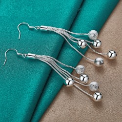 Lange zilveren oorbellen - kettingen met kralenOorbellen