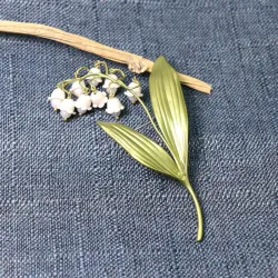 Broche muguet