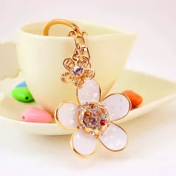 Daisy flower with pearl and crystal - keyringKeyrings