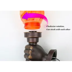 Retro hand with torch - wall lampWandlampen