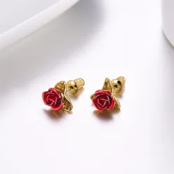 Gold stud earrings with red roseOorbellen