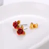 Gold stud earrings with red roseOorbellen