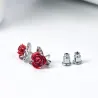 Gold stud earrings with red roseOorbellen