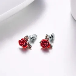 Gold stud earrings with red roseOorbellen