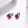Gold stud earrings with red roseOorbellen