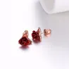 Gold stud earrings with red roseOorbellen