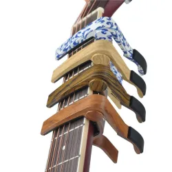 Capo en aluminium pour guitares électriques et acoustiques - clip