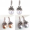 Boucles d'oreilles vintage de luxe avec fleur de cristal & perle